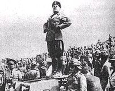 200px-mussolini_standing_on_a_tank